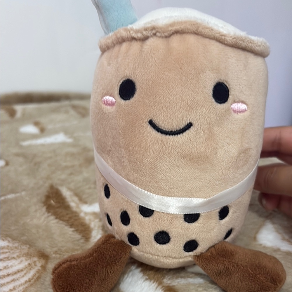 Tan and Black Stuffed Animal Plush Toy